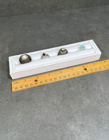 DRG6903 = White Leatherette Ring Slot Display 7-3/4"