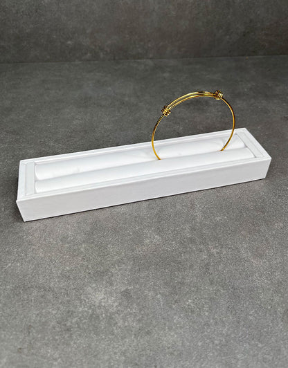 DRG6903 = White Leatherette Ring Slot Display 7-3/4"