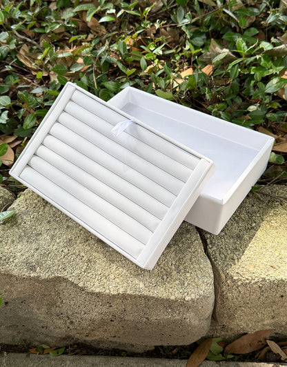 DRG6969 = White Leatherette Stackable Ring Tray With 7 Rows