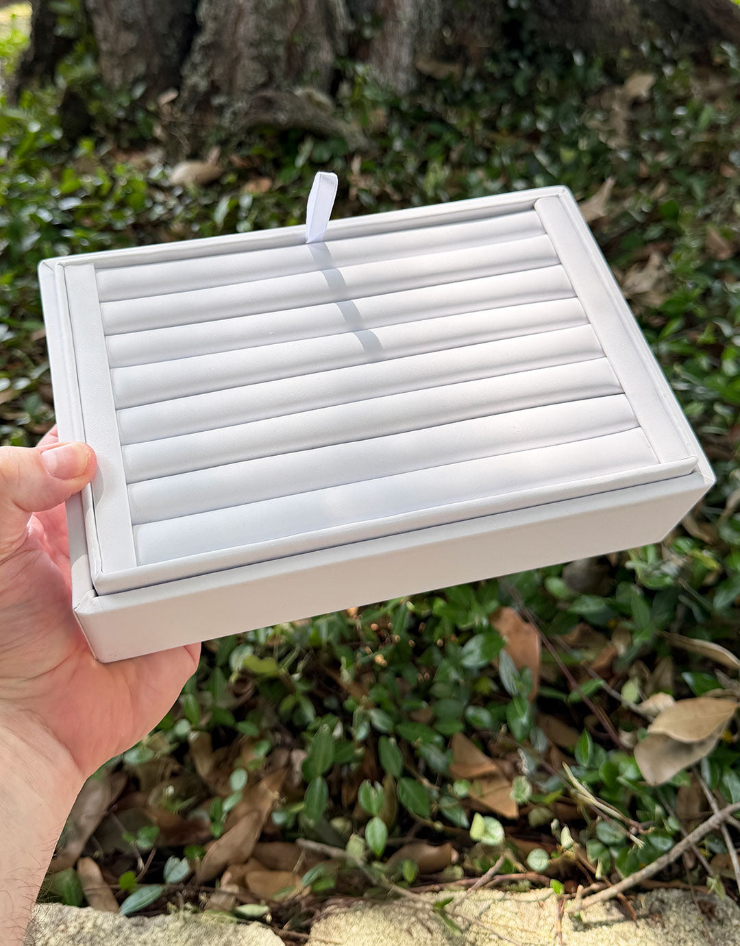 DRG6969 = White Leatherette Stackable Ring Tray With 7 Rows