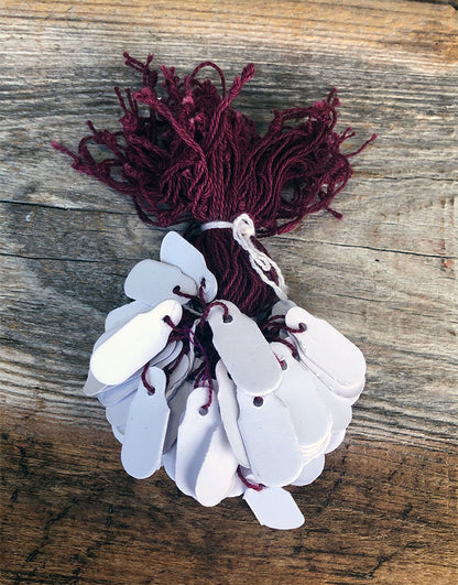 DTA6065 = Paper String Tag 3/4"x5/16" (Pkg of 1000)