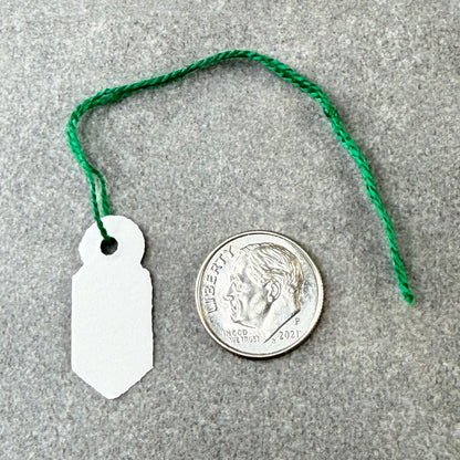 DTA6065 = Paper String Tag 3/4"x5/16" (Pkg of 1000)