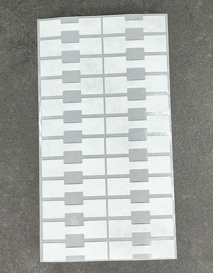 DTA7020 = White Tyvek Square Dumbbell Tags 1-9/16'' x 7/16'' (Pkg of 1000)