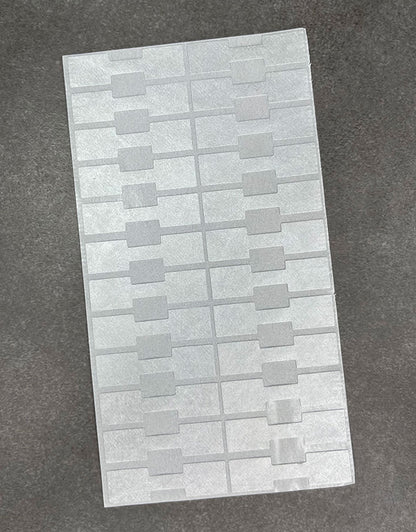 DTA7022 = Silver Tyvek Square Dumbbell Tags 1-9/16'' x 7/16'' (Pkg of 1000)