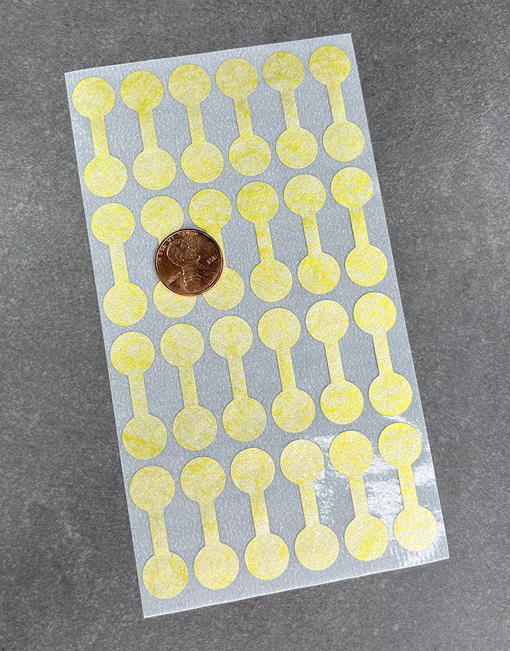 DTA7071 = Gold Tyvek Dumbbell Tags 1-3/8'' x 1/2'' (Pkg of 1000)