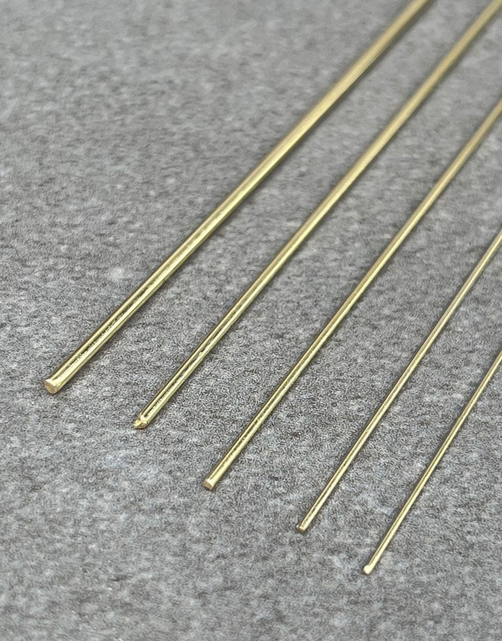 GW = 14K Yellow Gold Round Wire (sold by the inch)