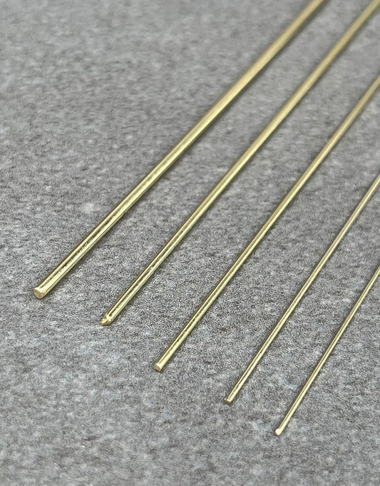 GW = 14K Yellow Gold Round Wire (sold by the inch)