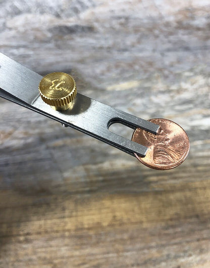 SO2003 = Titanium Bezel Clamp