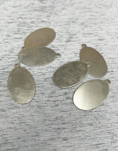 MSN20724 = NICKEL SILVER SHAPE - OVAL with ONE RING 24ga 1'' x 5/8'' OVAL with ONE RING (Pkg of 6)