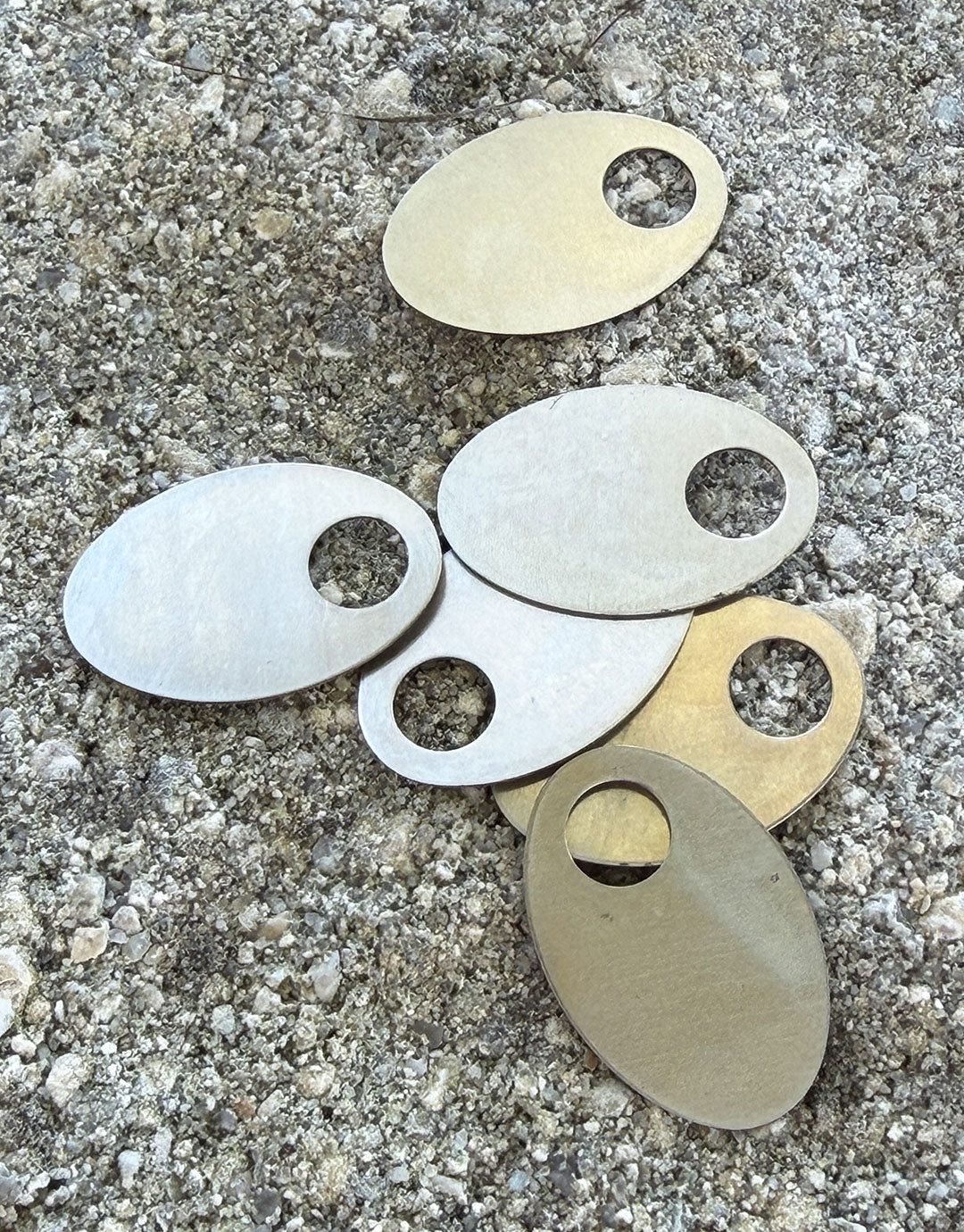 MSN21124 = NICKEL SILVER SHAPE - OVAL with 5/16'' ID HOLE 24ga 1-3/16'' x 3/4'' (Pkg of 6)